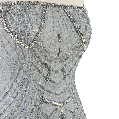 The Ghala – gray strapless tiered tassel mermaid gown | Riviera Couture