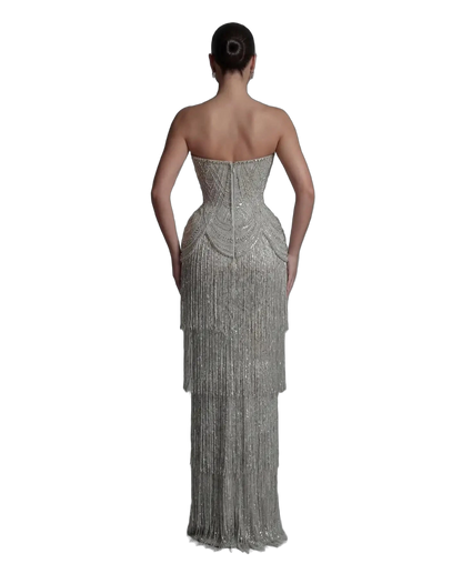 The Ghala – gray strapless tiered tassel mermaid gown | Riviera Couture
