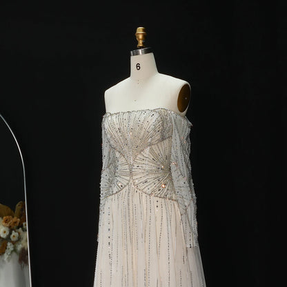 Beige Off Shoulder Long Sleeves Beaded Gown luxury evening dress by Riviera Couture