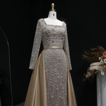 Champagne Beaded Long Sleeve Mermaid Evening Gown with Overskirt — Arabic — Riviera Couture GCC Luxury Evening Gown