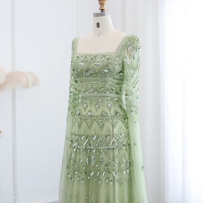 Sage Green Wine Red Burgundy Evening Gown with Cape Sleeve — Arabic Luxury 2026 — Riviera Couture GCC Luxury Evening Gown