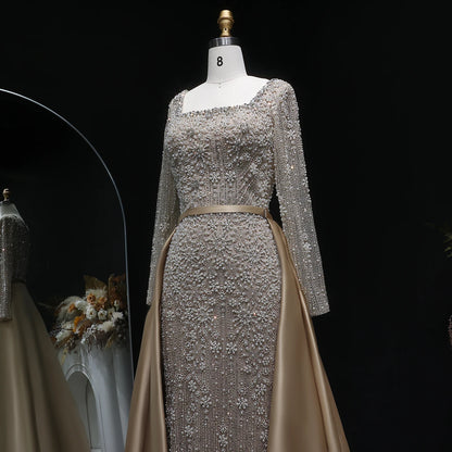 Champagne Beaded Long Sleeve Mermaid Evening Gown with Overskirt — Arabic — Riviera Couture GCC Luxury Evening Gown