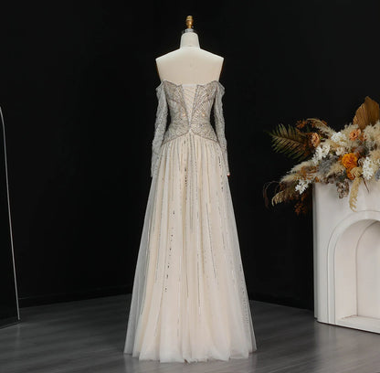Beige Off Shoulder Long Sleeves Beaded Gown luxury evening dress by Riviera Couture