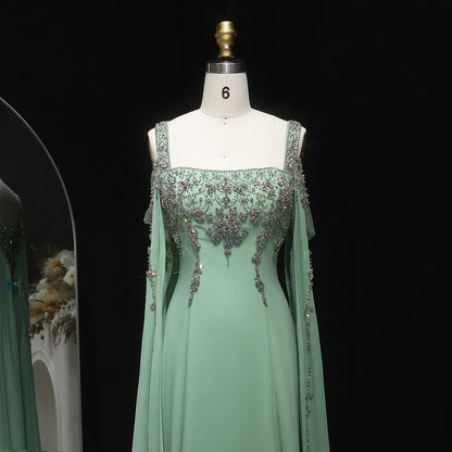 Green Blue Crystal Evening Gown with Flowing Cape Sleeve — Arabic Luxury — Riviera Couture GCC Luxury Evening Gown