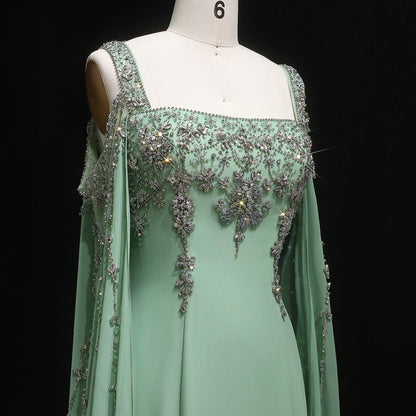 Blue Blue Crystal Evening Gown with Flowing Cape Sleeve — Arabic Luxury — Riviera Couture GCC Luxury Evening Gown