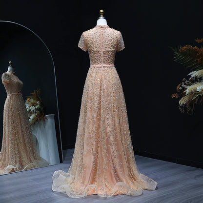 Peach Peach Embroidered Evening Gown with Bow — Luxury Beaded Arabic — Riviera Couture GCC Luxury Evening Gown