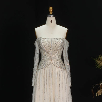 Beige Off Shoulder Long Sleeves Beaded Gown luxury evening dress by Riviera Couture